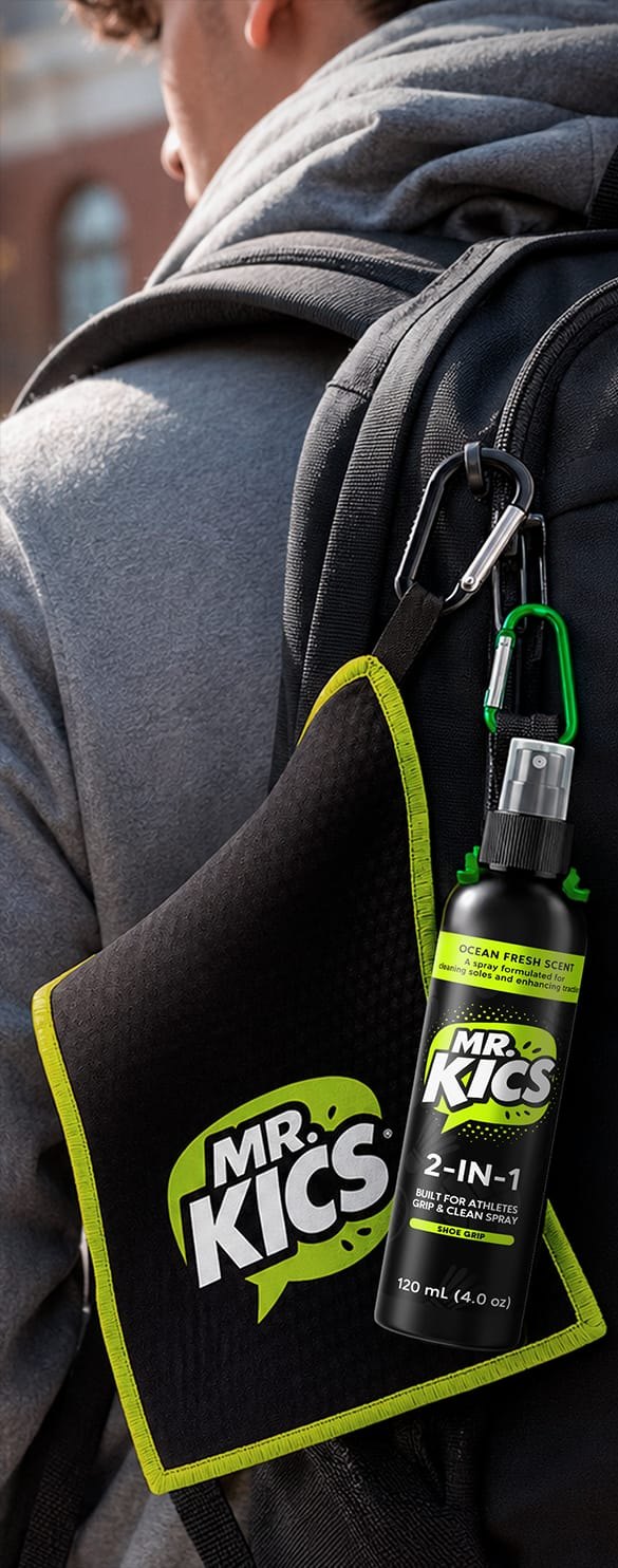Mr. Kics spray and towel clipped to a backpack