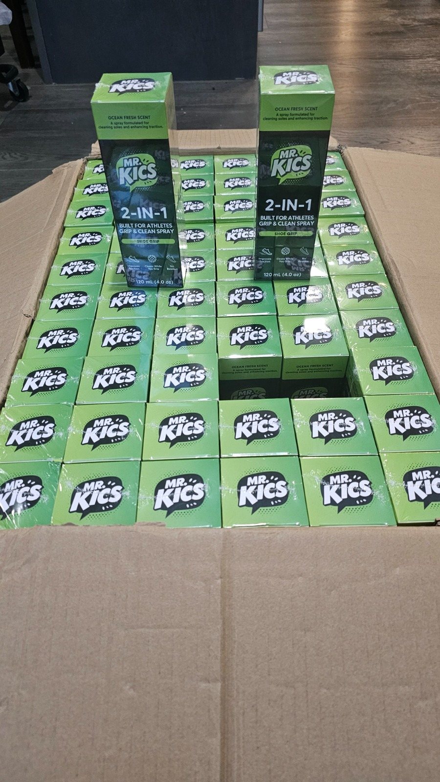 Boxes of Mr. Kics grip spray ready to ship