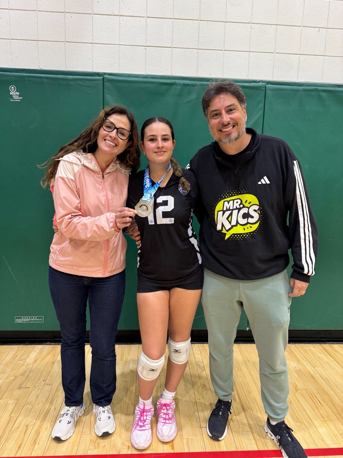 The Mr. Kics family at a volleyball tournament